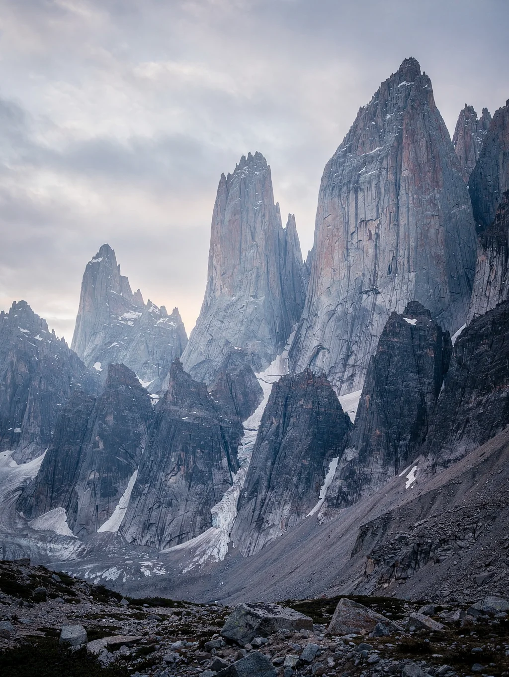 Jagged granite peaks in Patagonia under soft twilight